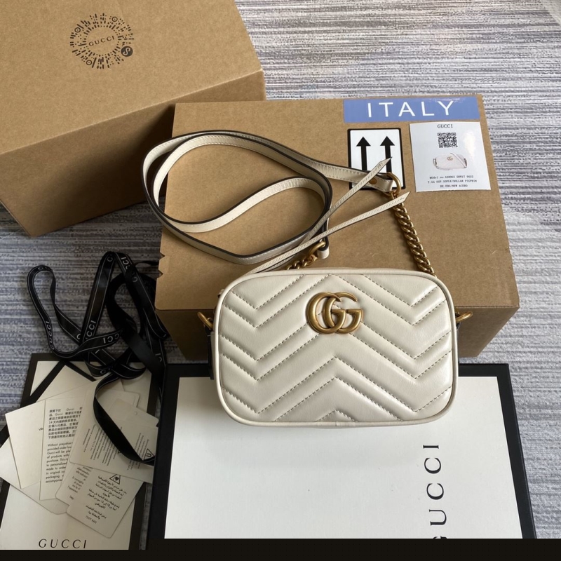 G*u*i satchel bags